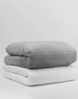 Couverture lestée 12 kg grise pliée