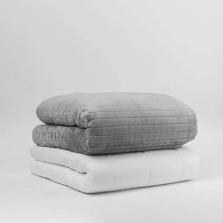 Couverture lestée 12 kg grise pliée